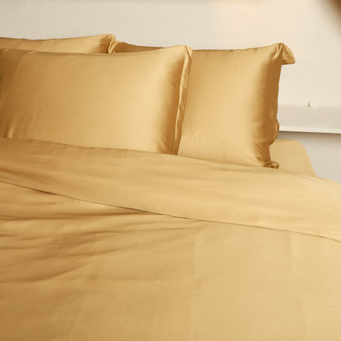 Kussenslopen op een opgemaakt bed. De Eco Bamboe kussenslopen zijn van de best kwaliteit en zacht voor je huid en haar.
